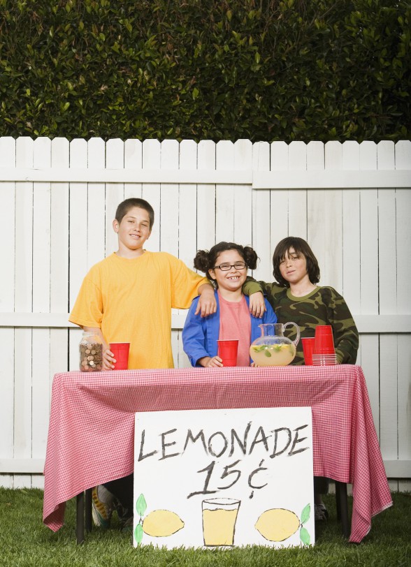 Mixed Race children selling lemonade